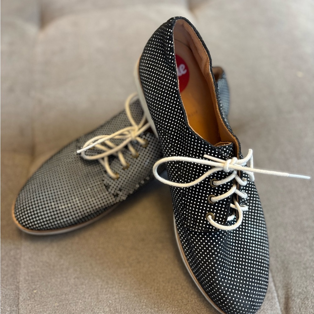 Rollie Women's Derby lace-up flat oxfords in a black and white polka dot print